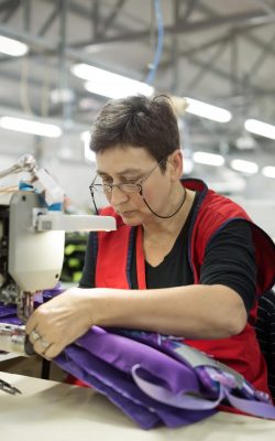 woman-working-in-textile-industry-YG3P6EF-min